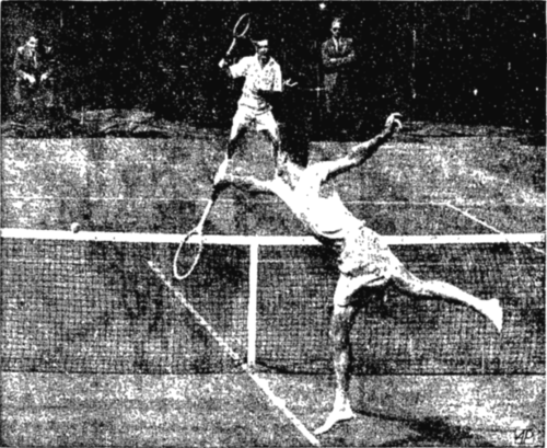 Ted Schroeder (foreground), U. S. Davis cup player, leaps and hits ball into the net in the third Davis cup match at the West Side Tennis club, Forest Hills, N. Y. In background is his Australian opponent, Dinny Pails. Schroeder played the match barefooted. The American won.